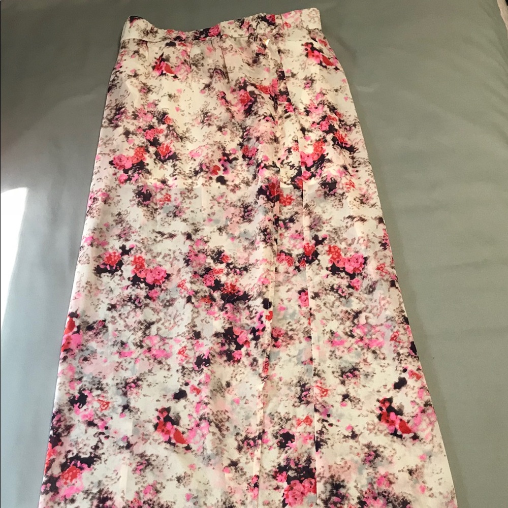 Long floral skirt with a mini lining and slit